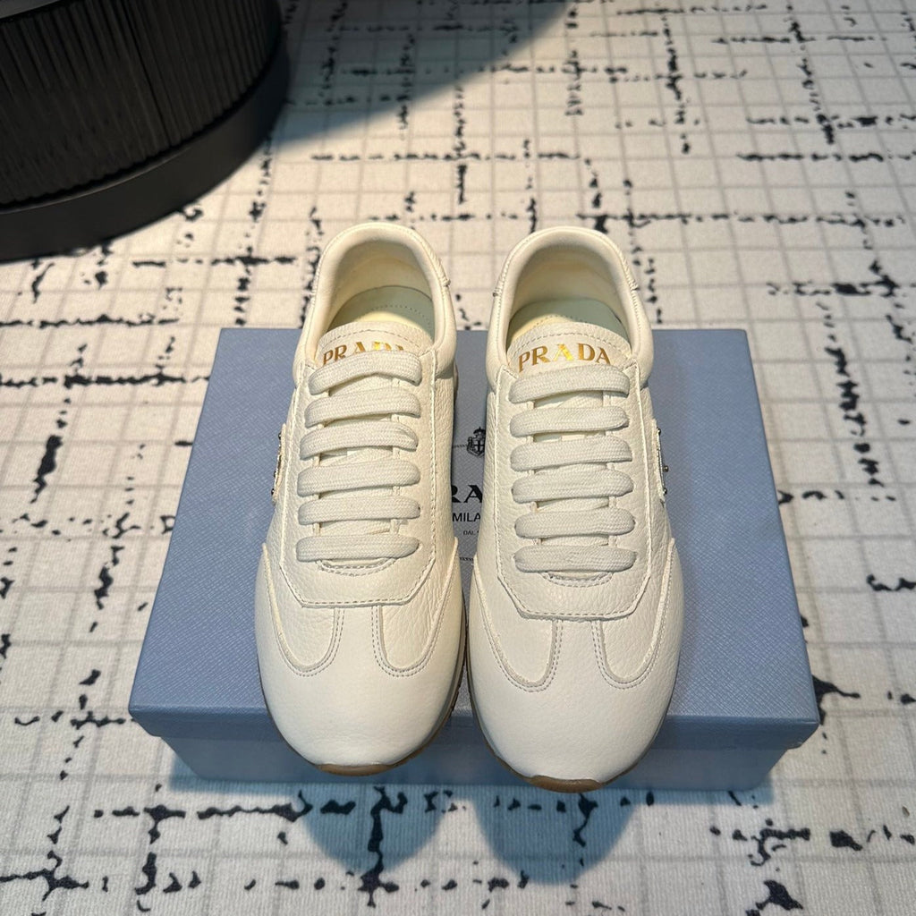 PRADA TRIANGLE LOGO SNEAKERS WHITE CALFSKIN