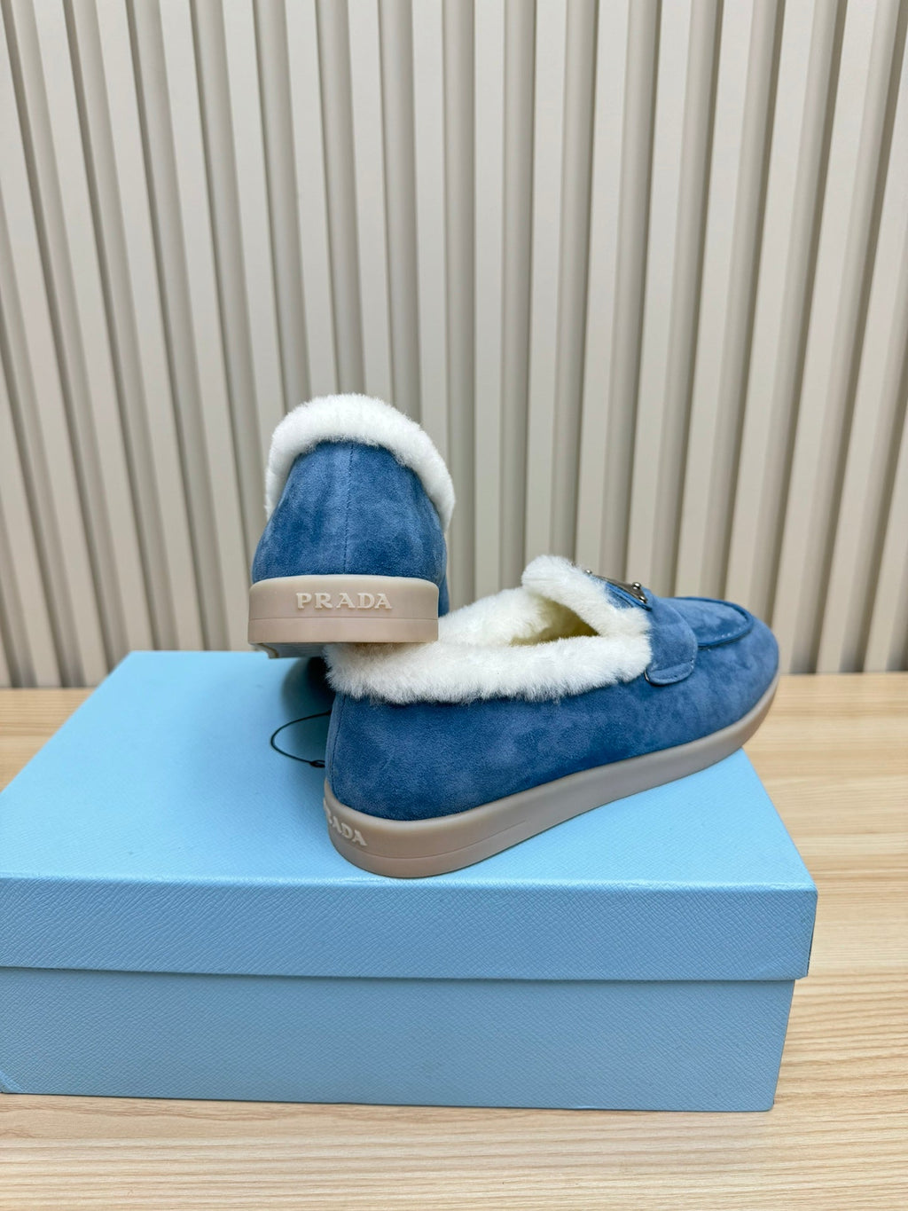 PRADA LOAFER IN AZURE BLUE SUEDE AND FUR LINING ATTACHED TRIANGLE LOGO