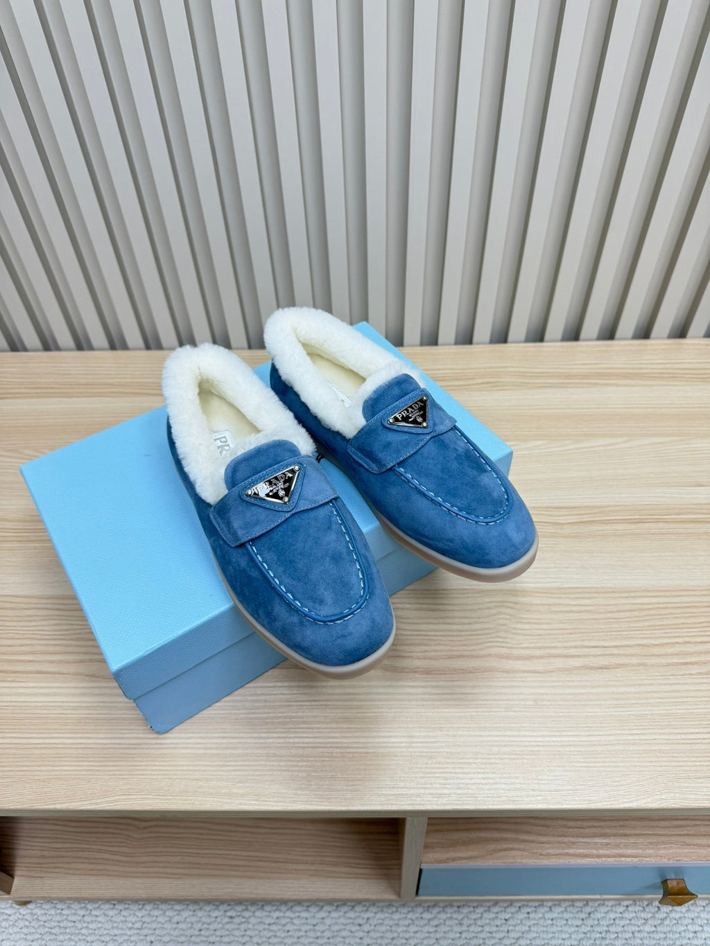 PRADA LOAFER IN AZURE BLUE SUEDE AND FUR LINING ATTACHED TRIANGLE LOGO