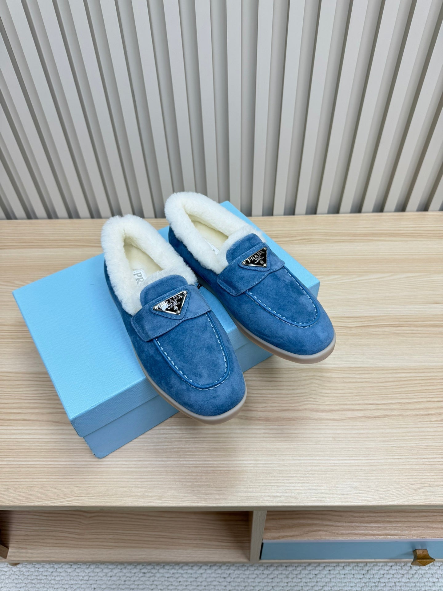 PRADA LOAFER IN AZURE BLUE SUEDE AND FUR LINING ATTACHED TRIANGLE LOGO