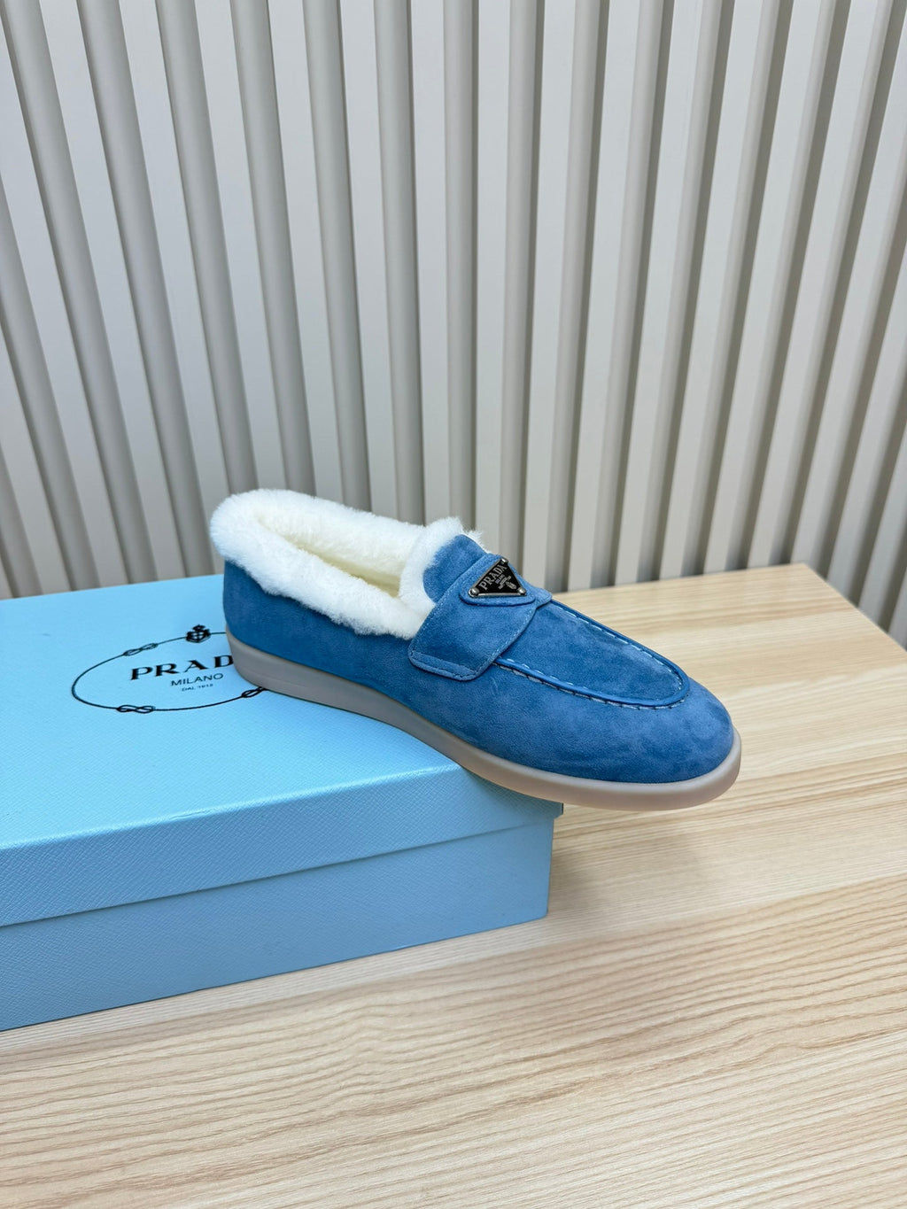 PRADA LOAFER IN AZURE BLUE SUEDE AND FUR LINING ATTACHED TRIANGLE LOGO