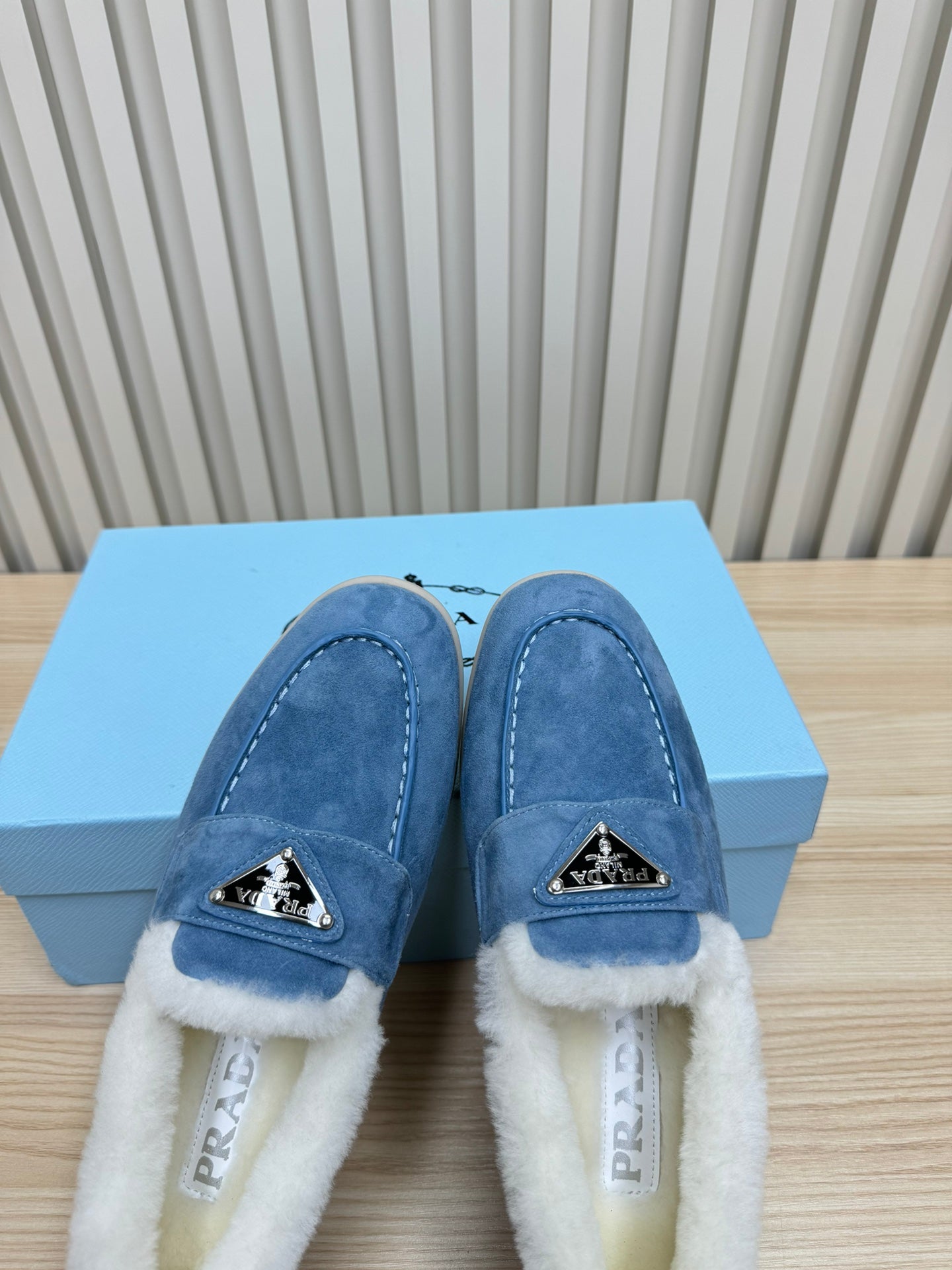 PRADA LOAFER IN AZURE BLUE SUEDE AND FUR LINING ATTACHED TRIANGLE LOGO