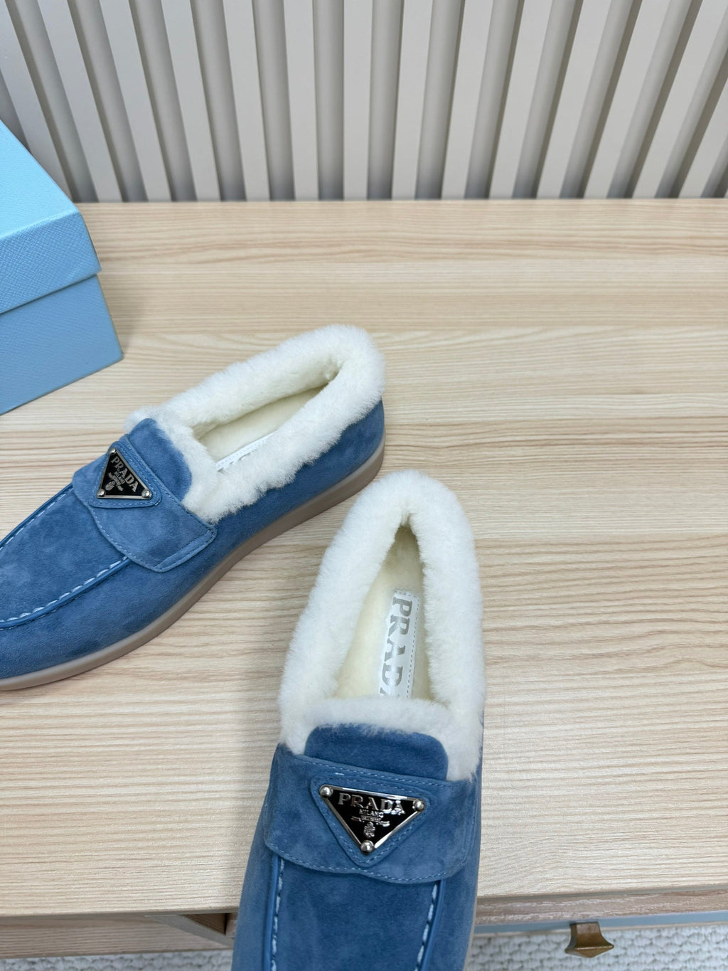 PRADA LOAFER IN AZURE BLUE SUEDE AND FUR LINING ATTACHED TRIANGLE LOGO