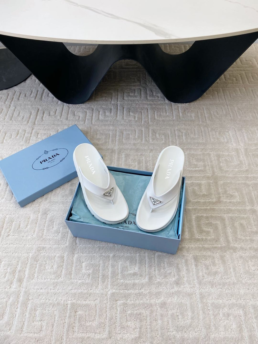 PRADA THICK-SOLED FLIP FLOPS IN WHITE RUBBER