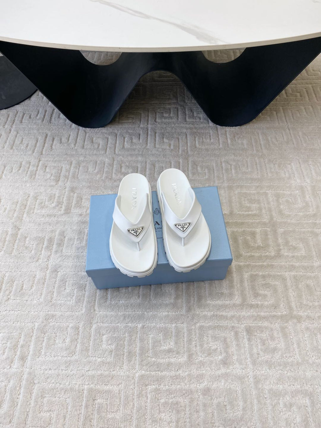 PRADA THICK-SOLED FLIP FLOPS IN WHITE RUBBER