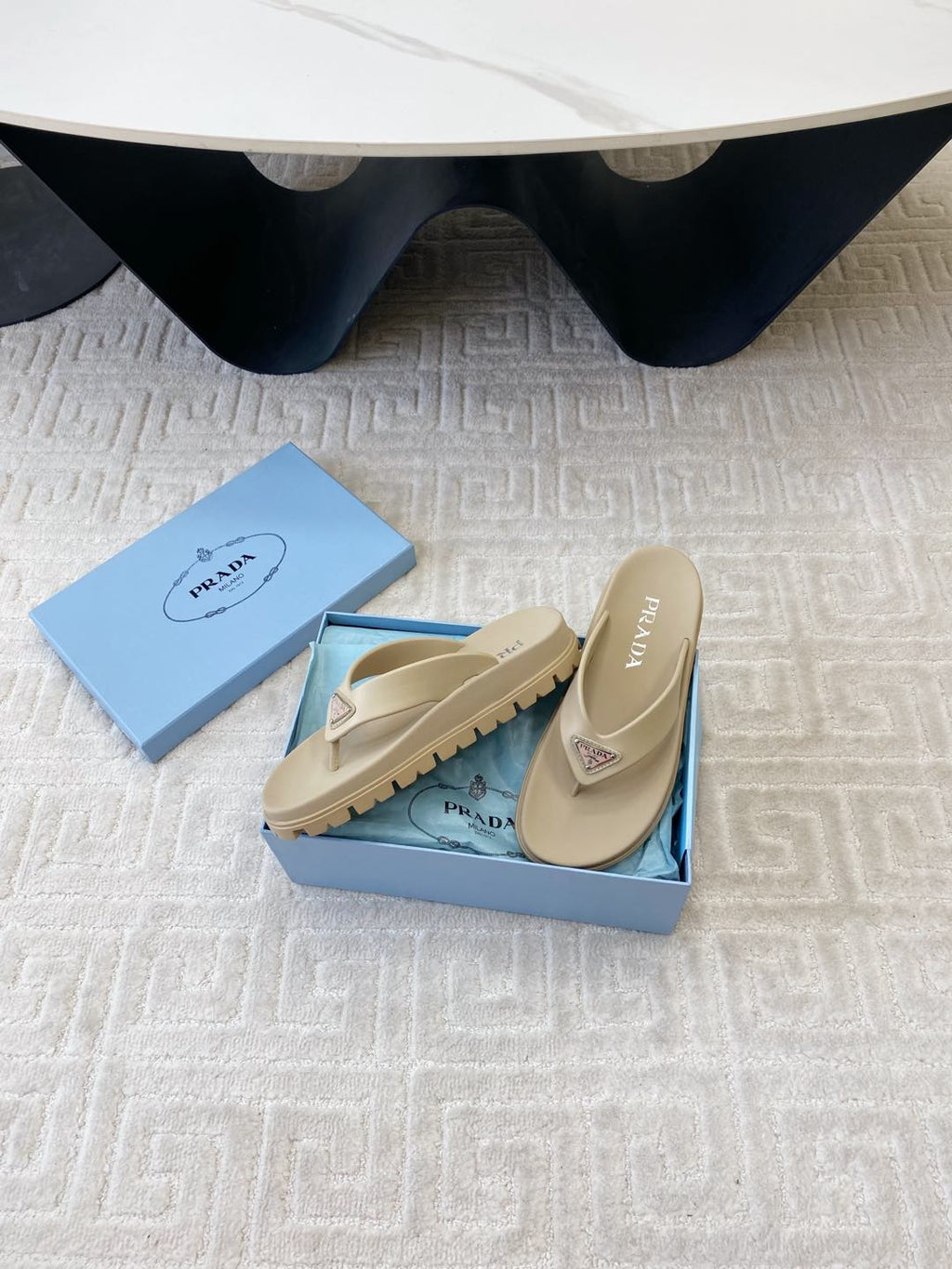 PRADA THICK-SOLED FLIP FLOPS IN ECRU BEIGE RUBBER