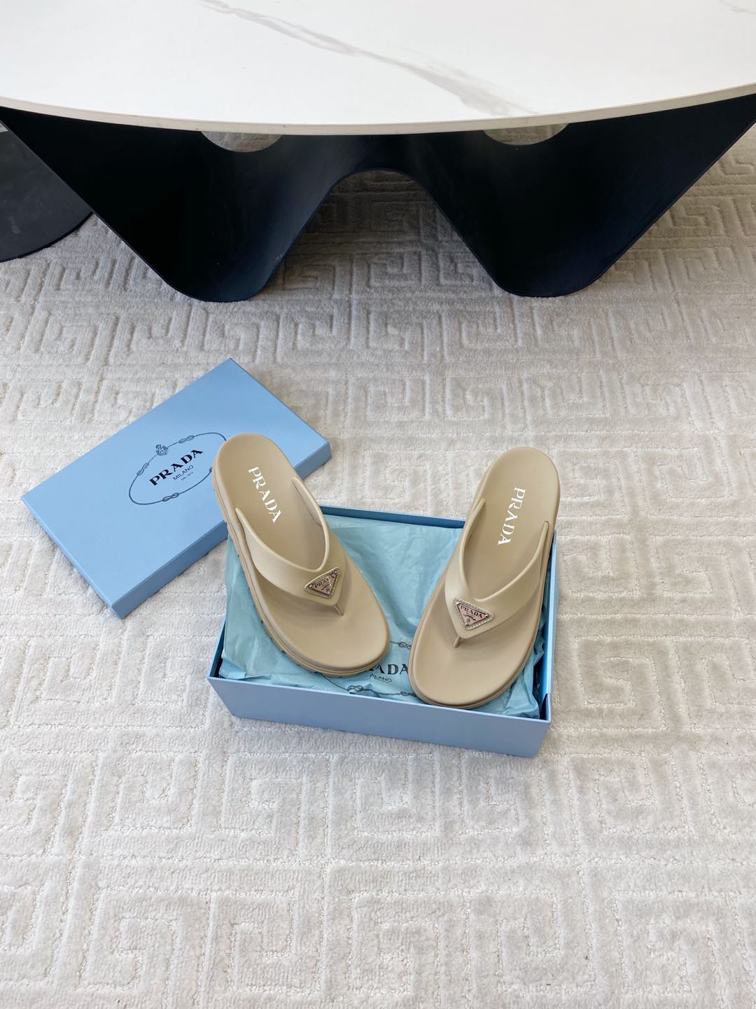 PRADA THICK-SOLED FLIP FLOPS IN ECRU BEIGE RUBBER