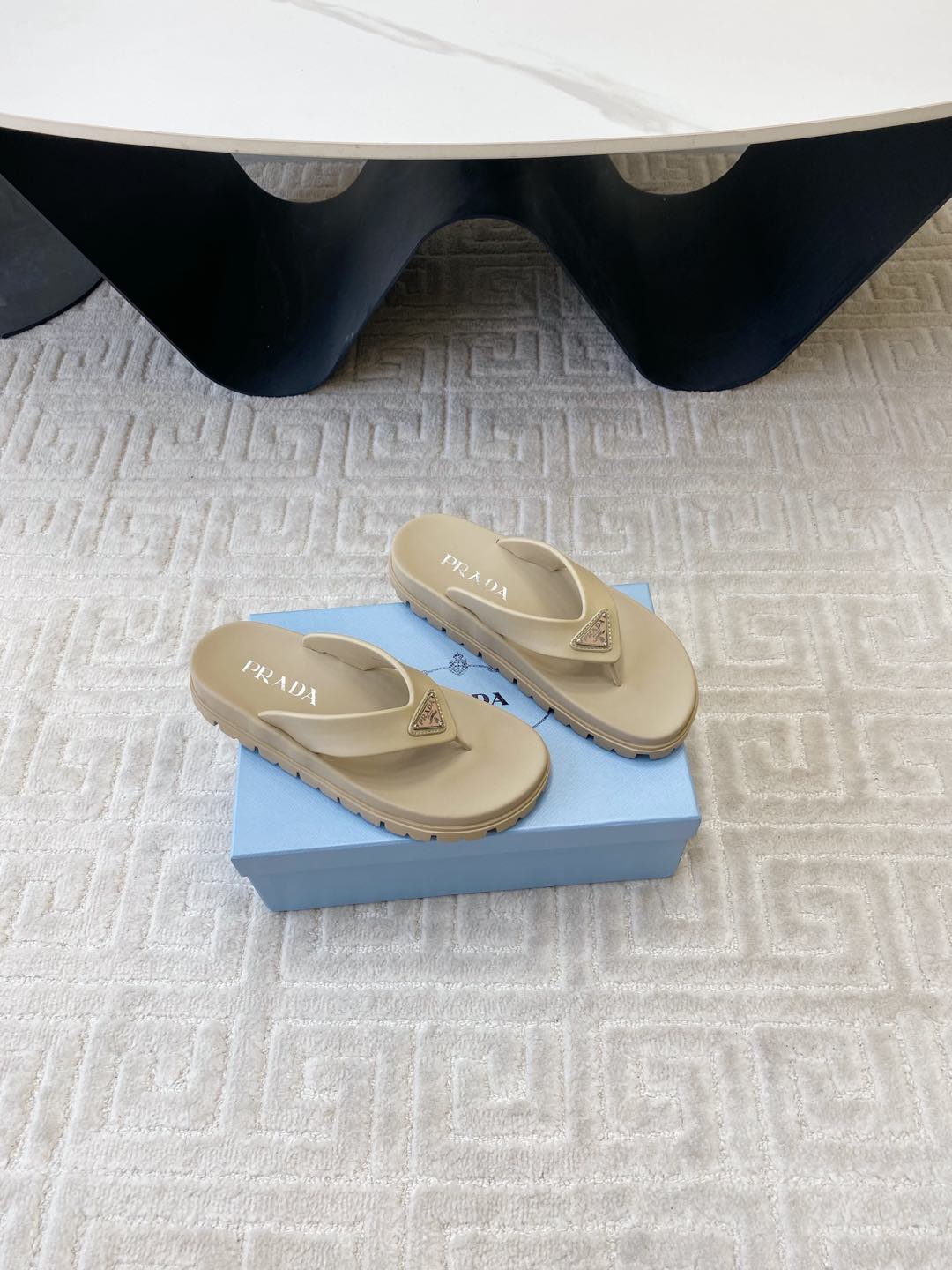 PRADA THICK-SOLED FLIP FLOPS IN ECRU BEIGE RUBBER