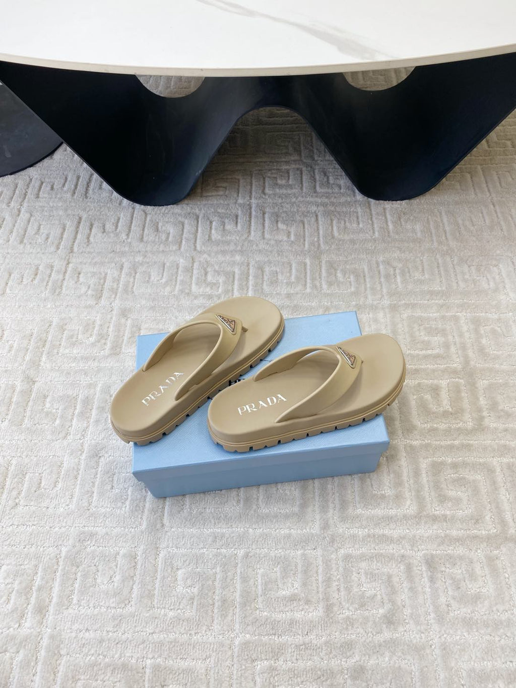 PRADA THICK-SOLED FLIP FLOPS IN ECRU BEIGE RUBBER
