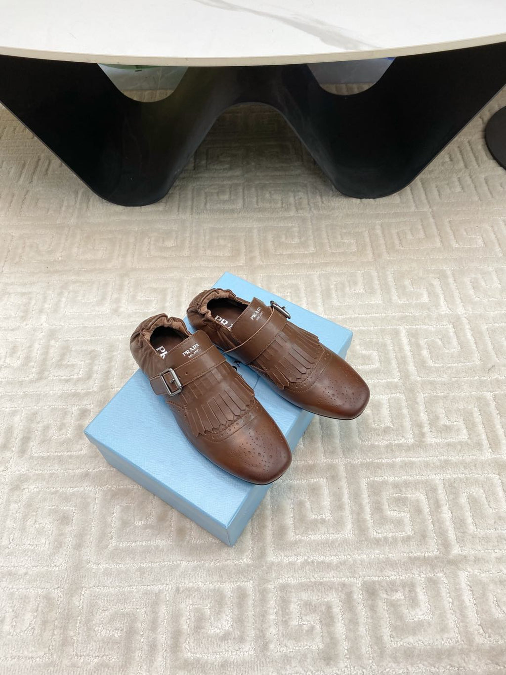 PRADA TASSEL LOAFERS IN RUSSET BROWN LAMBSKIN