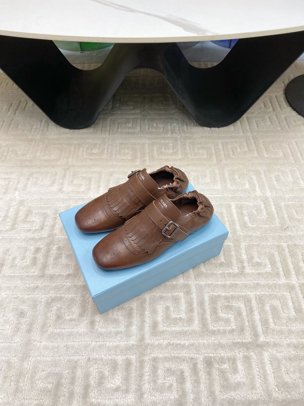 PRADA TASSEL LOAFERS IN RUSSET BROWN LAMBSKIN