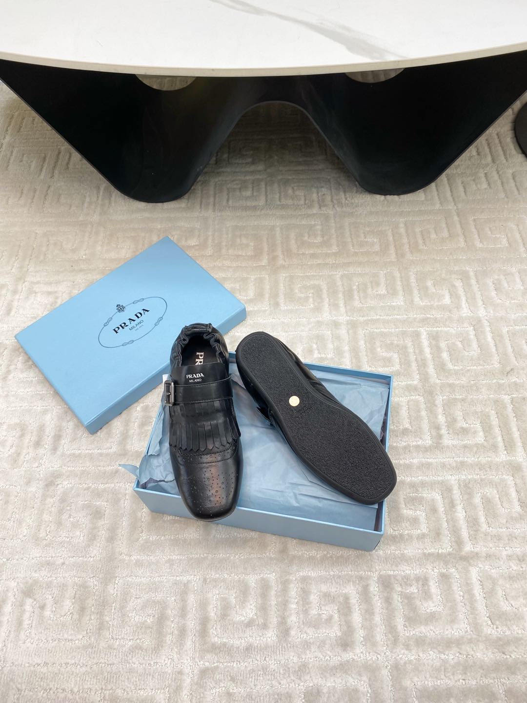 PRADA TASSEL LOAFERS IN BLACK LAMBSKIN