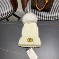 GUCCI BEANIE HAT IN WHITE WOOL 403393