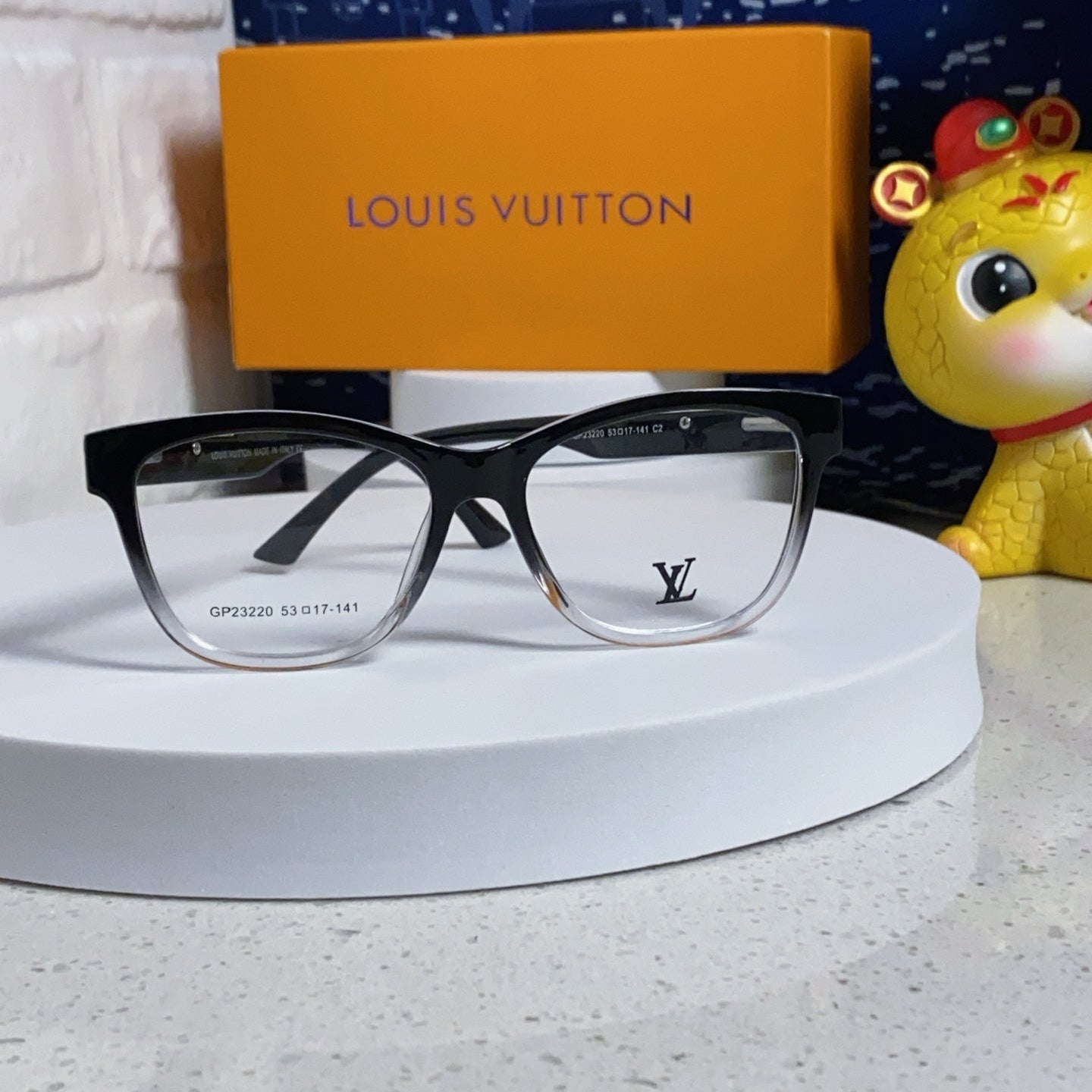 LOUIS VUITTON CAT EYE SUNGLASSES 570279 IN BLACK AND CLEAR ACETATE EMBOSSED LOGO