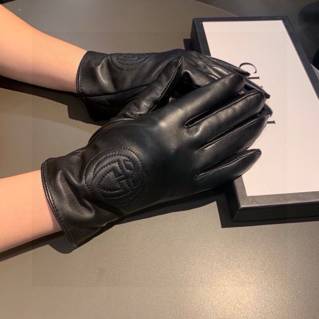 GUCCI GLOVES WITH EMBROIDERY DESIGN IN BLACK LAMBSKIN AND WOOL LINING 407774
