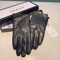 GUCCI GLOVES WITH EMBROIDERY DESIGN IN BLACK LAMBSKIN AND WOOL LINING 407774