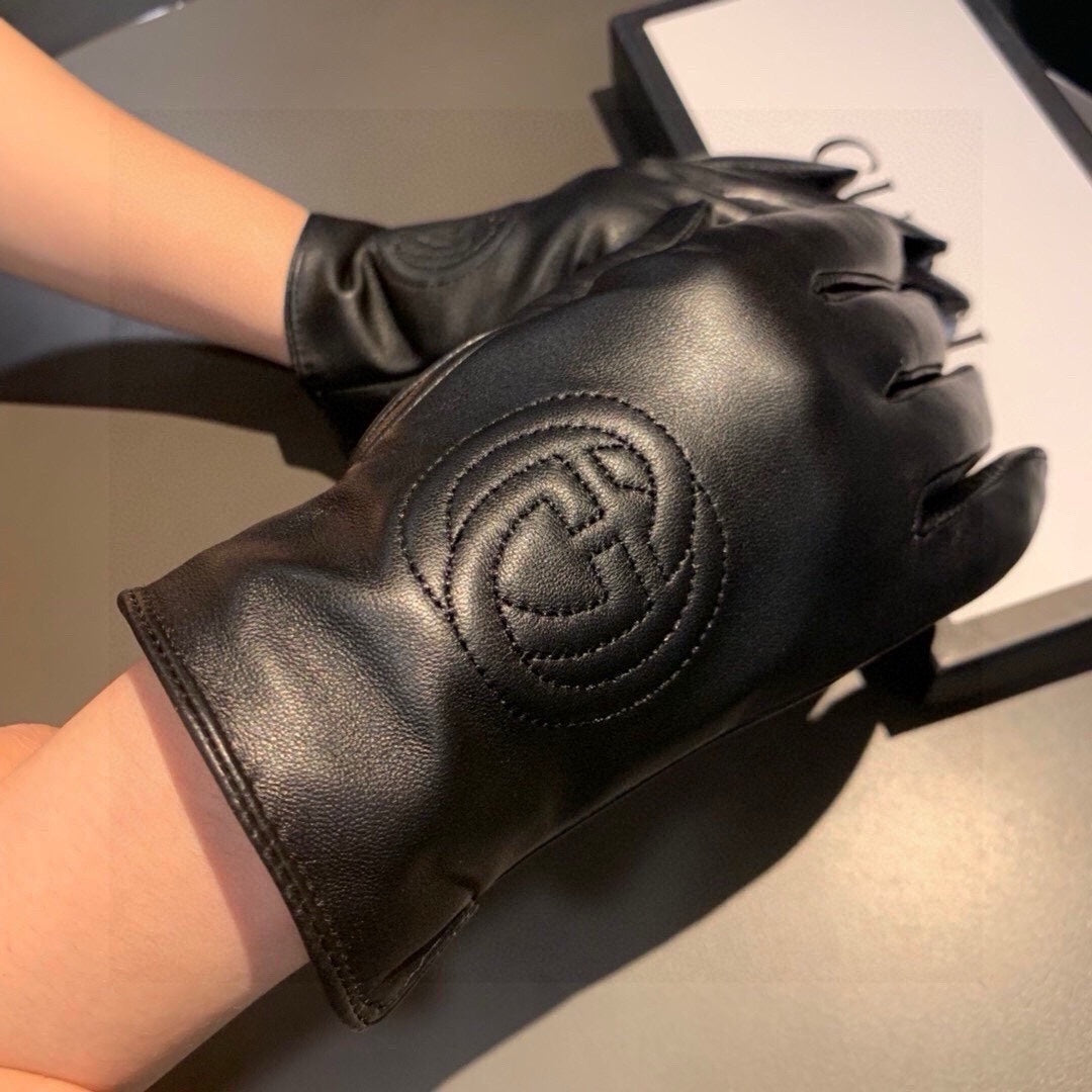 GUCCI GLOVES WITH EMBROIDERY DESIGN IN BLACK LAMBSKIN AND WOOL LINING 407774