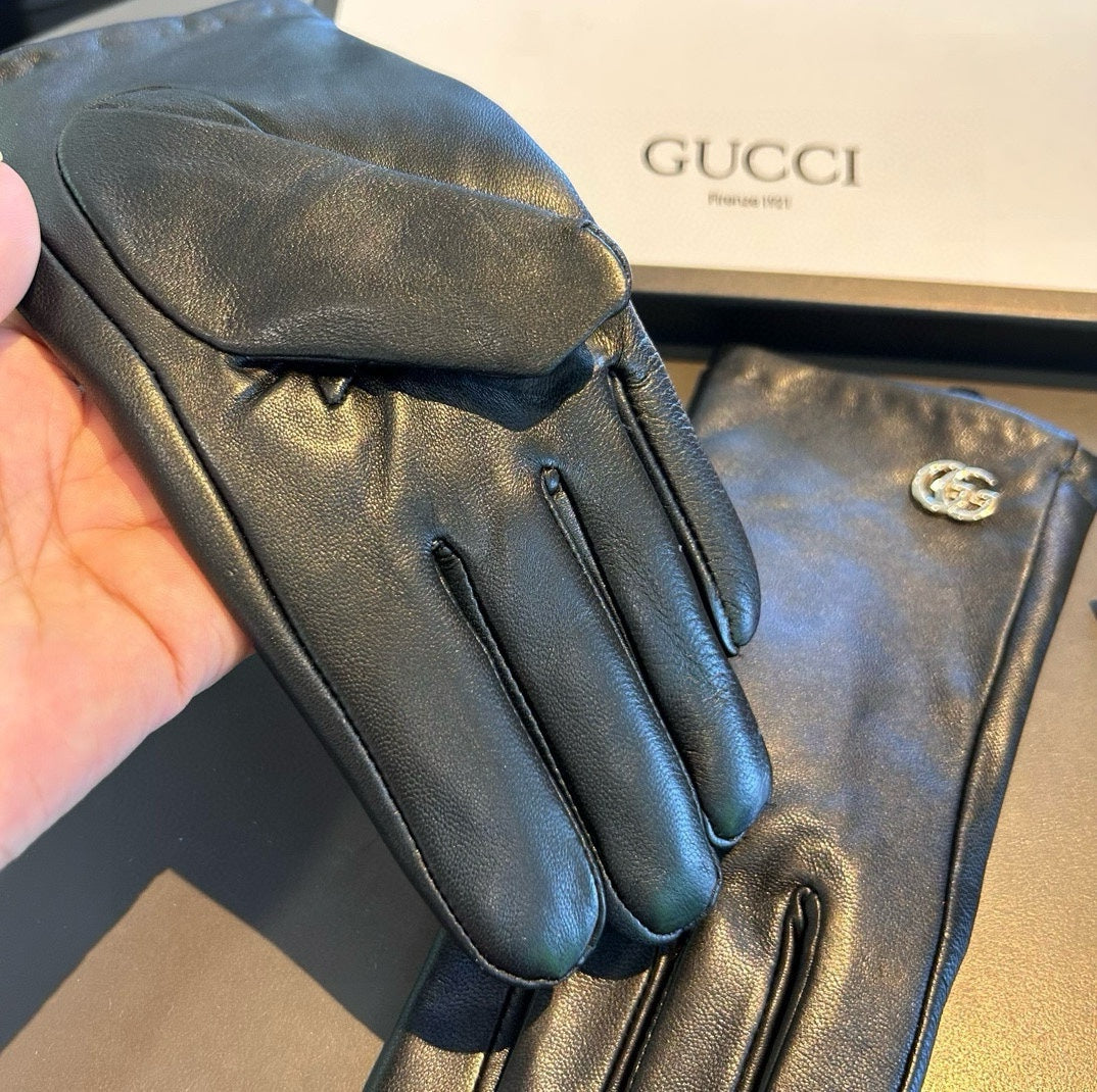 GUCCI TOUCHSCREEN GLOVES IN BLACK LAMBSKIN AND SHEARLING LINING 463863
