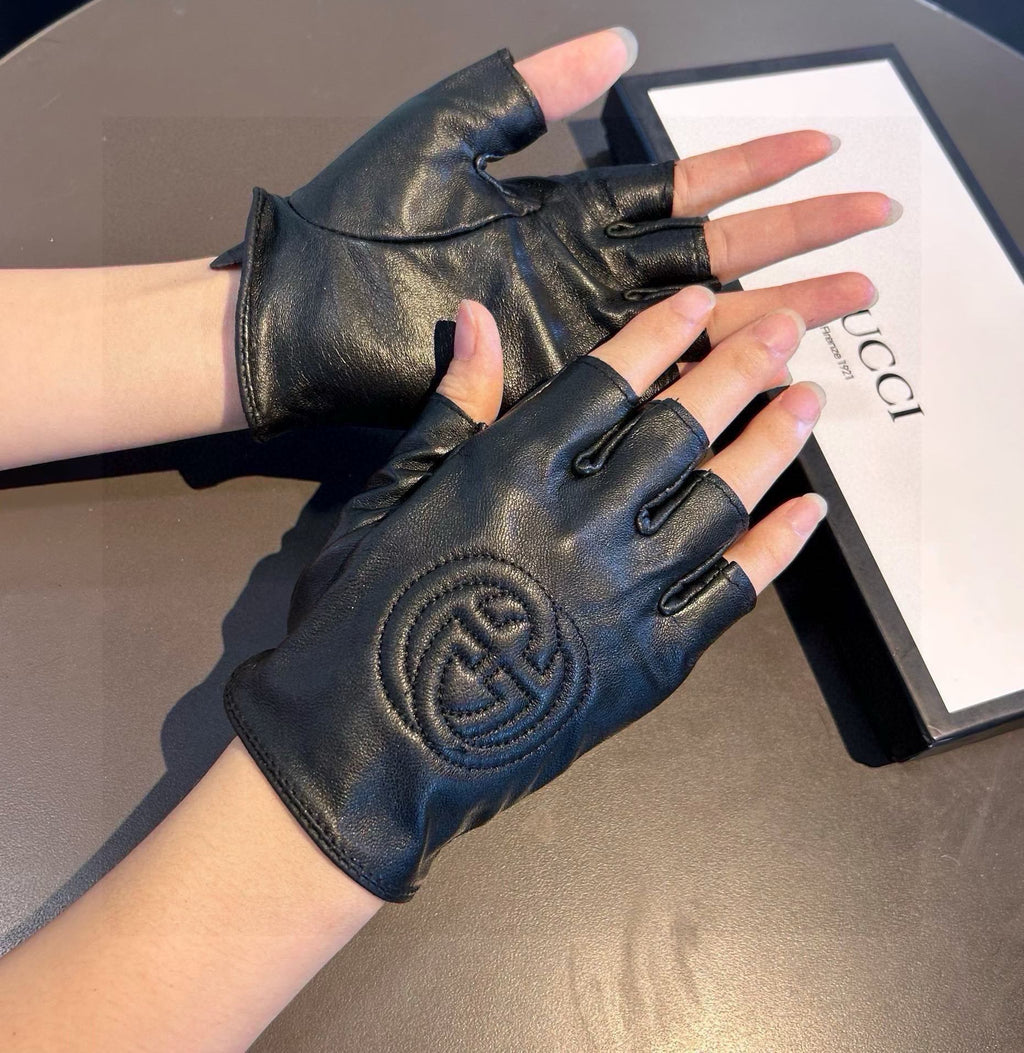 GUCCI FINGERLESS GLOVES IN BLACK LAMBSKIN AND CASHMERE LINING 465790