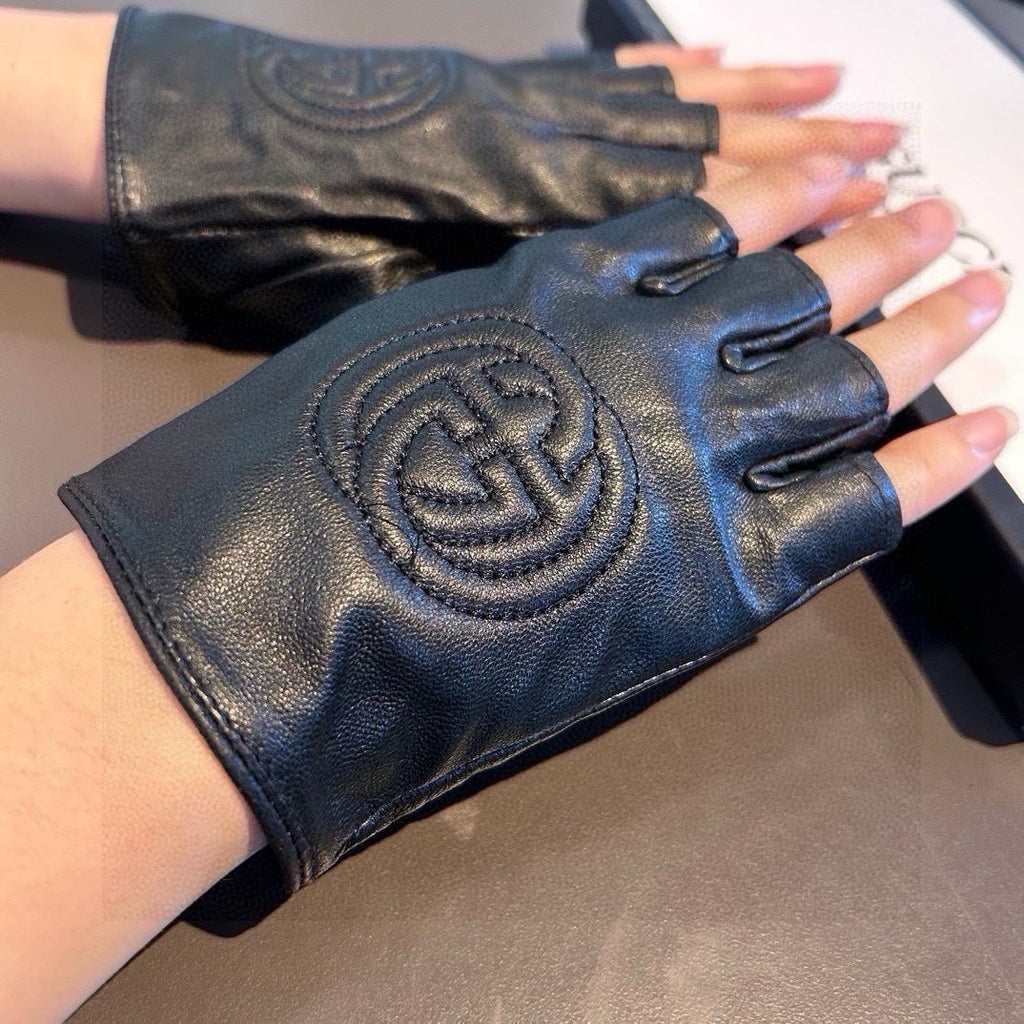 GUCCI FINGERLESS GLOVES IN BLACK LAMBSKIN AND CASHMERE LINING 465790