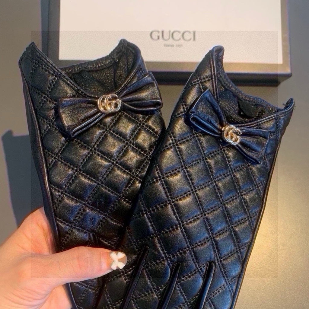 GUCCI TOUCHSCREEN GLOVES WITH BOW IN BLACK LAMBSKIN 467968