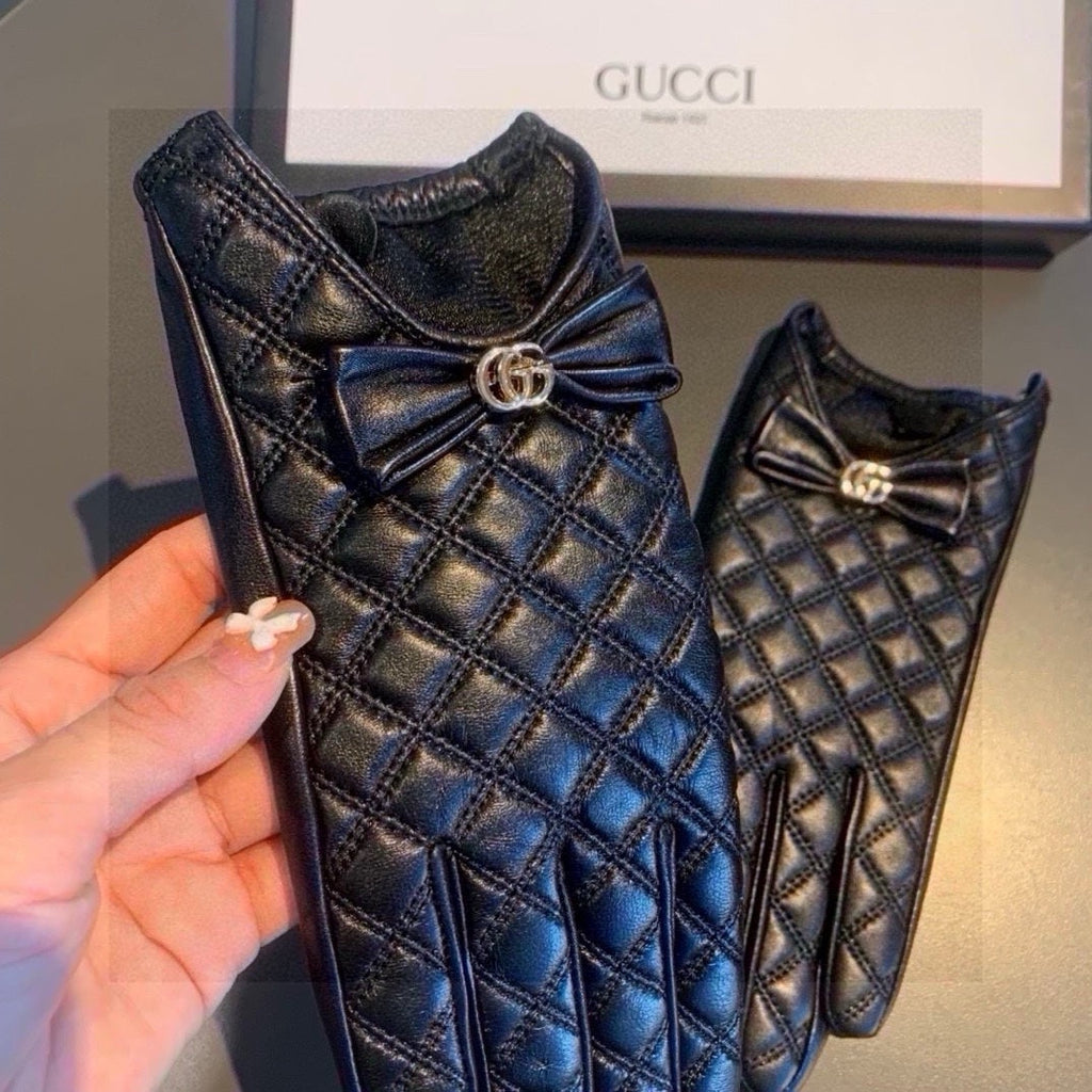 GUCCI TOUCHSCREEN GLOVES WITH BOW IN BLACK LAMBSKIN 467968