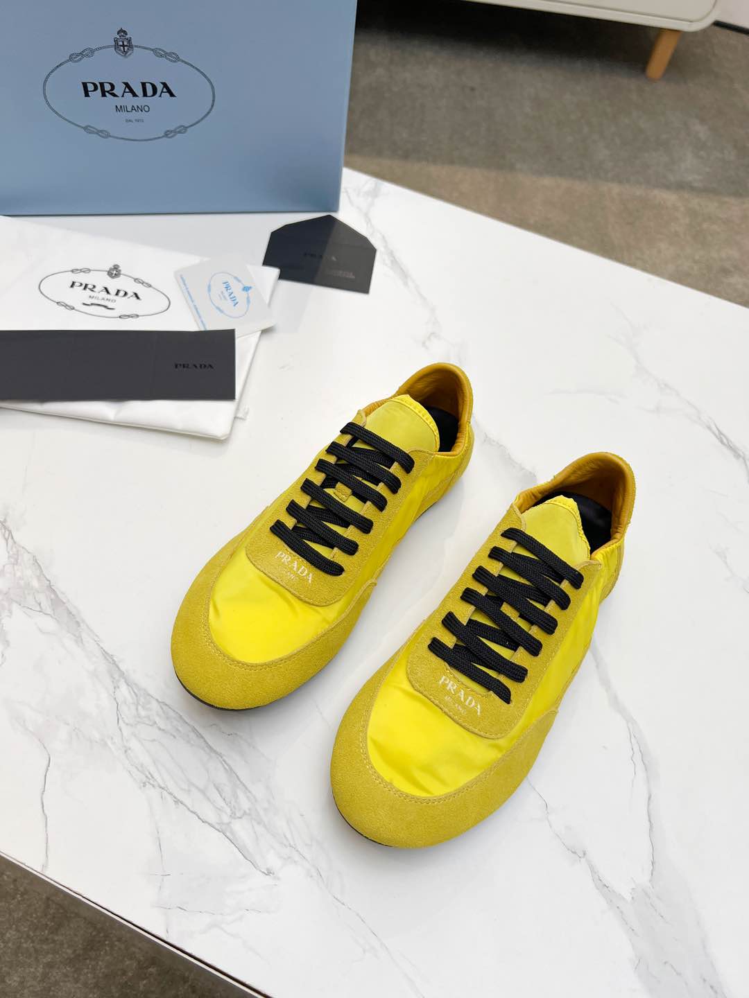 PRADA COLLAPSE SNEAKERS IN YELLOW SUEDE AND NYLON