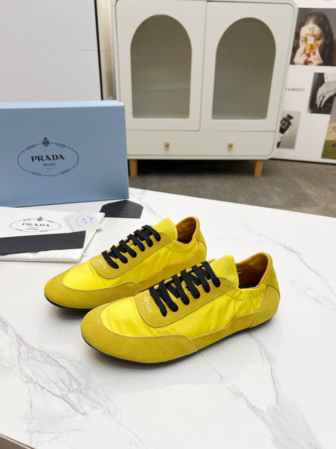PRADA COLLAPSE SNEAKERS IN YELLOW SUEDE AND NYLON