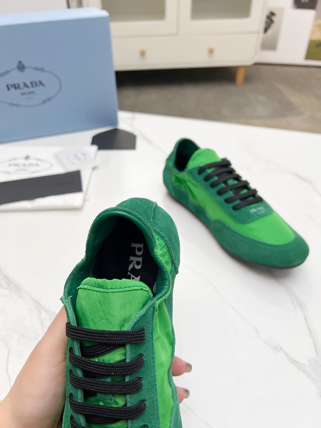 PRADA COLLAPSE SNEAKERS IN GREEN SUEDE AND NYLON