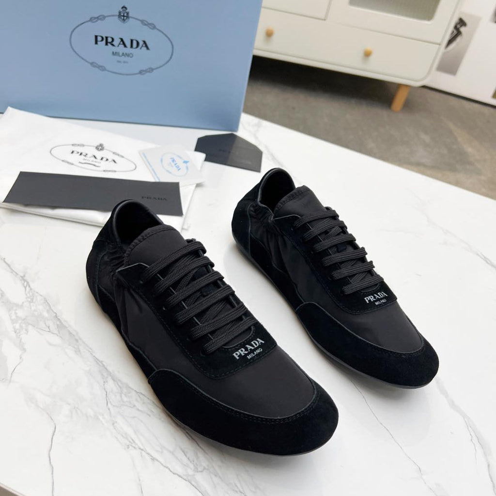 PRADA COLLAPSE SNEAKERS IN BLACK SUEDE AND NYLON