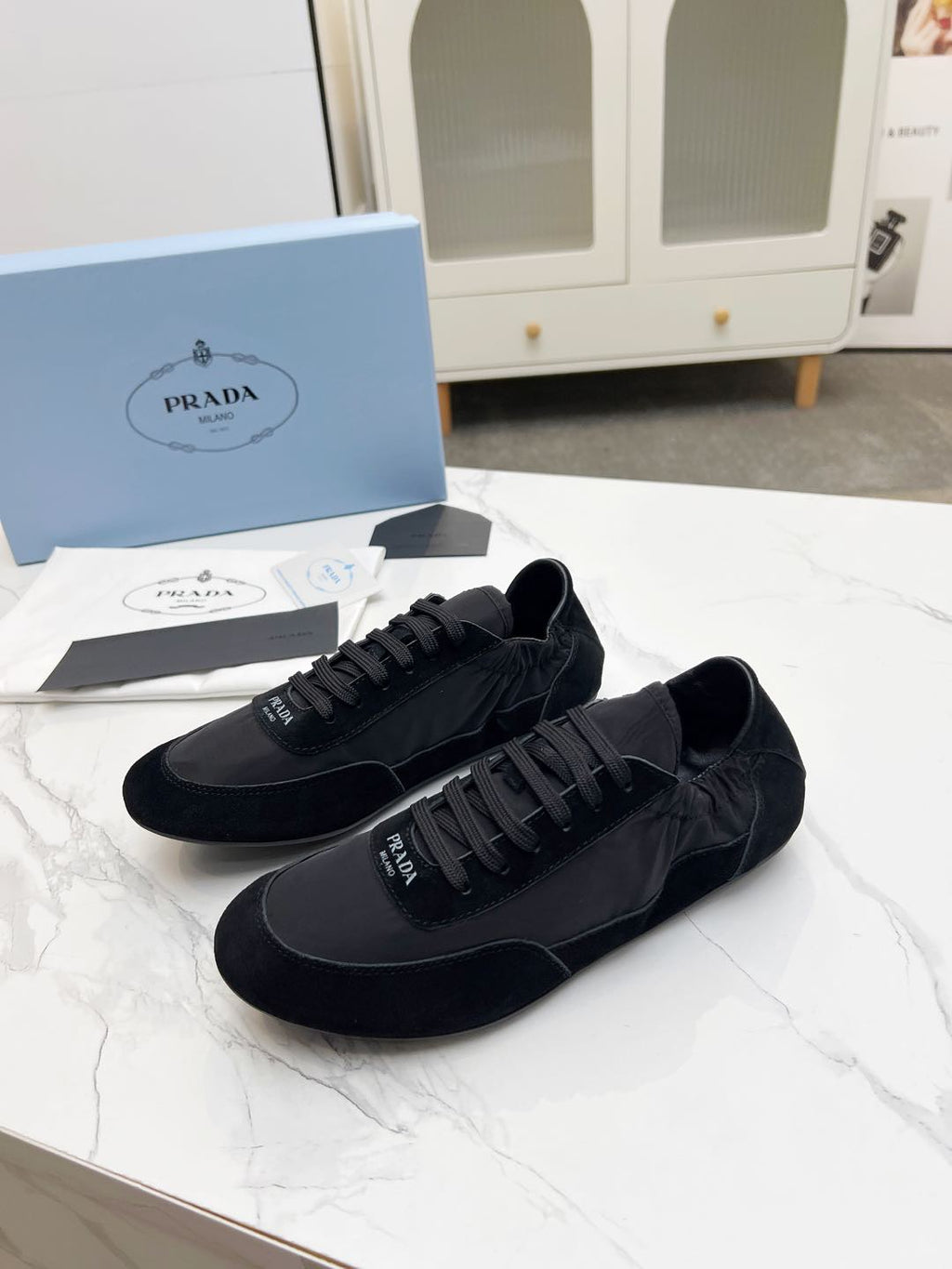 PRADA COLLAPSE SNEAKERS IN BLACK SUEDE AND NYLON