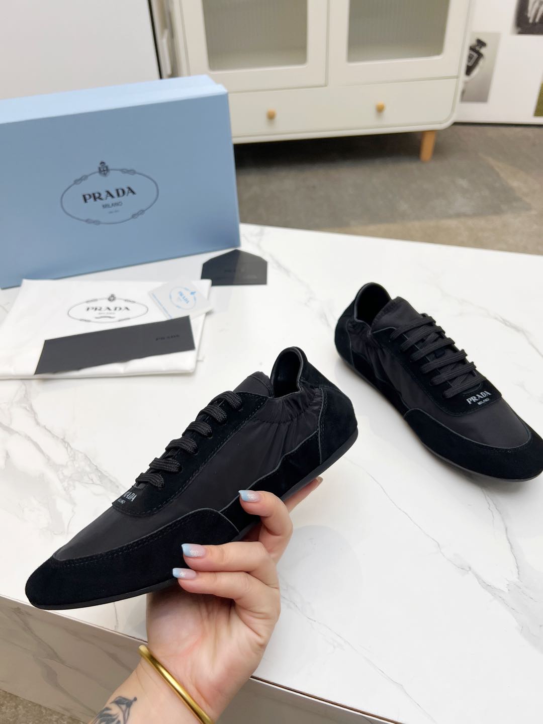 PRADA COLLAPSE SNEAKERS IN BLACK SUEDE AND NYLON