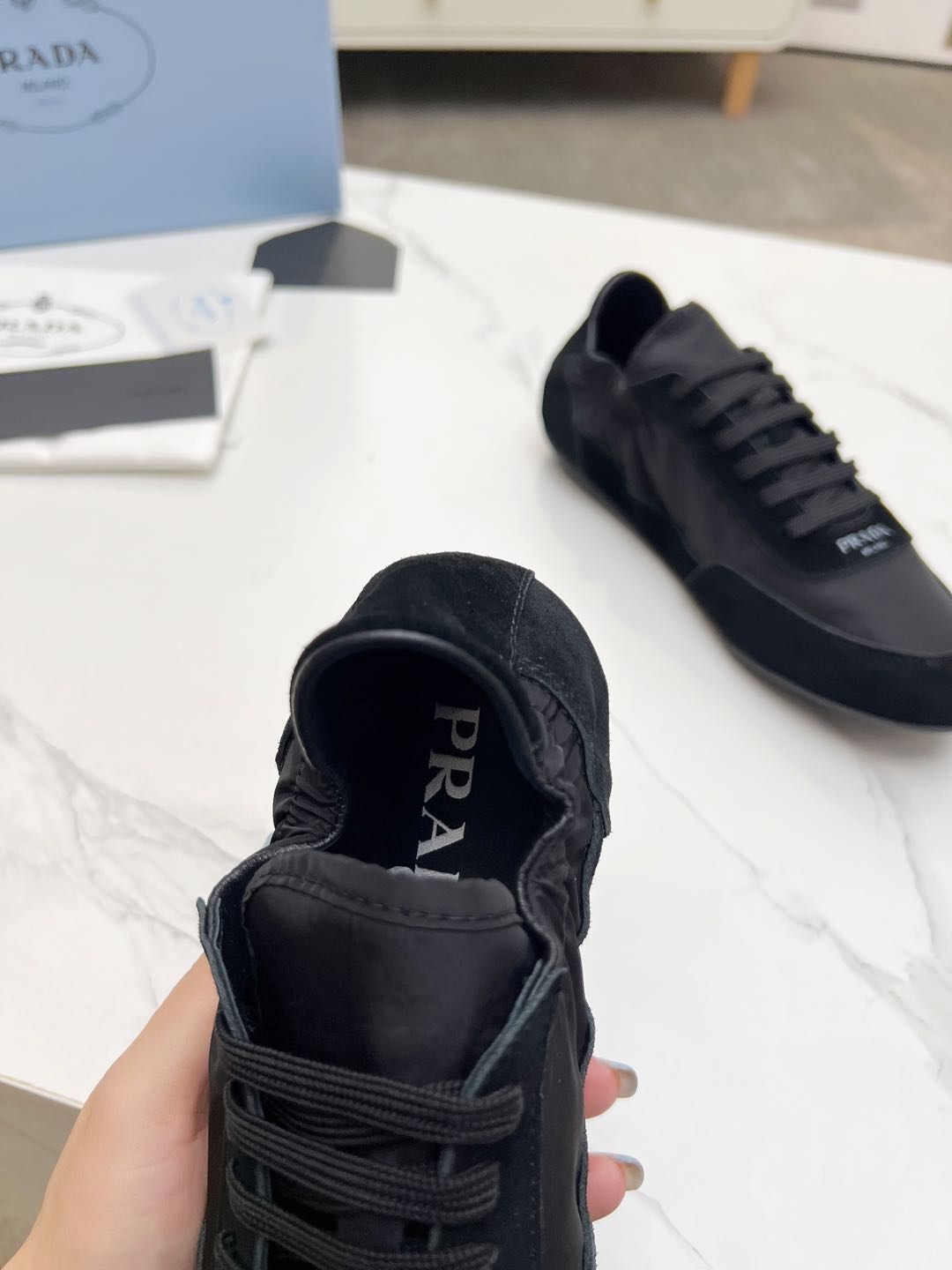 PRADA COLLAPSE SNEAKERS IN BLACK SUEDE AND NYLON