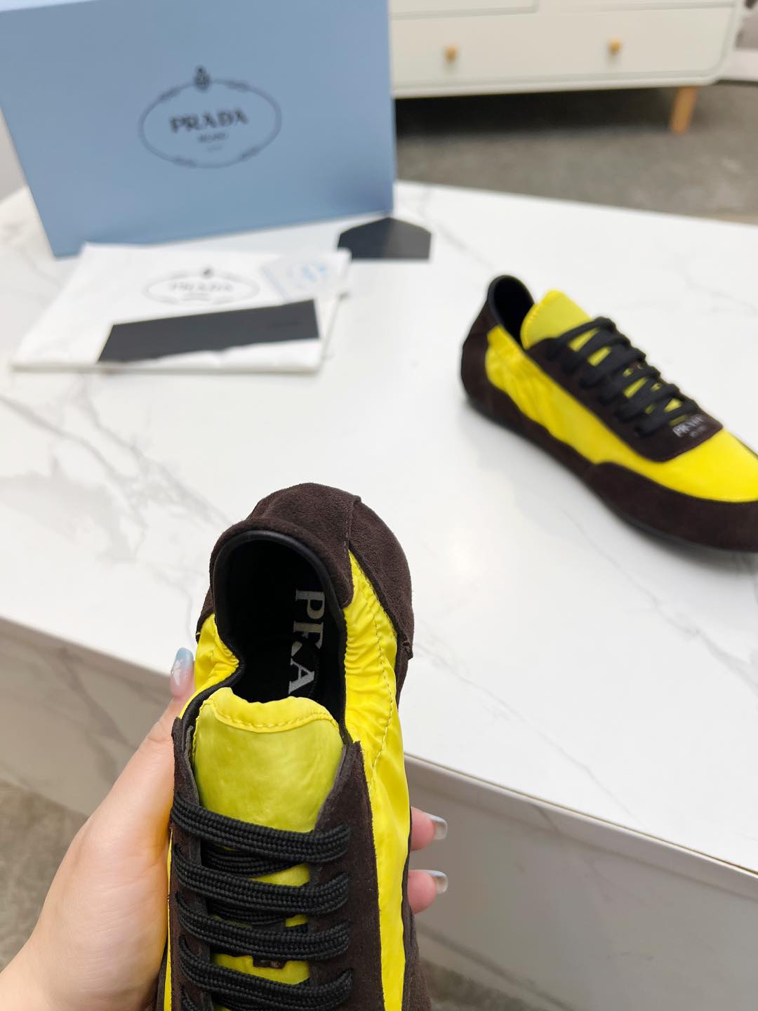 PRADA COLLAPSE SNEAKERS IN CHOCOLATE SUEDE AND YELLOW NYLON