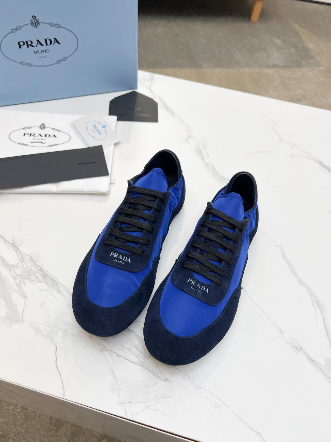 PRADA COLLAPSE SNEAKERS IN BLUE SUEDE AND NYLON