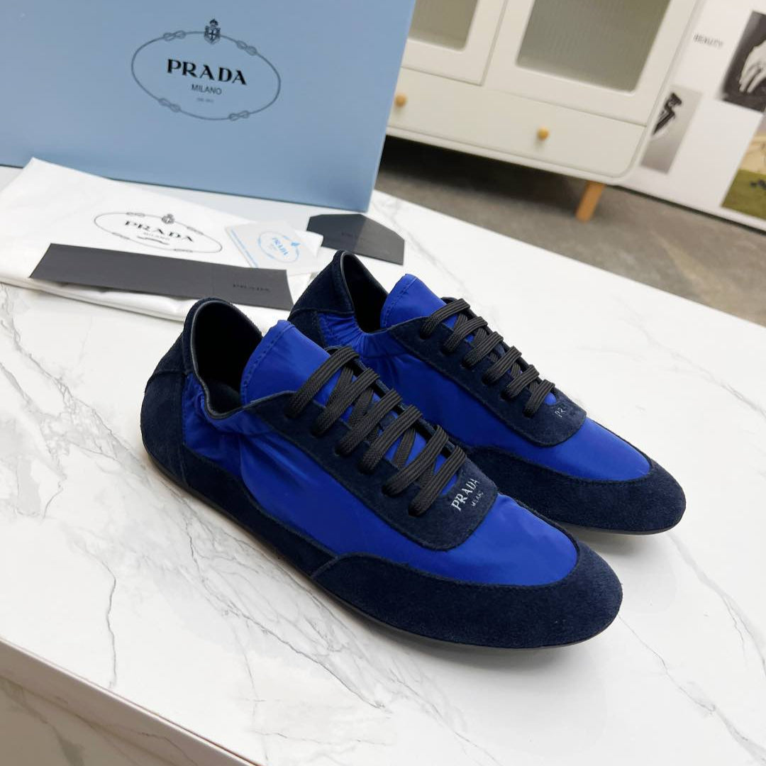 PRADA COLLAPSE SNEAKERS IN BLUE SUEDE AND NYLON