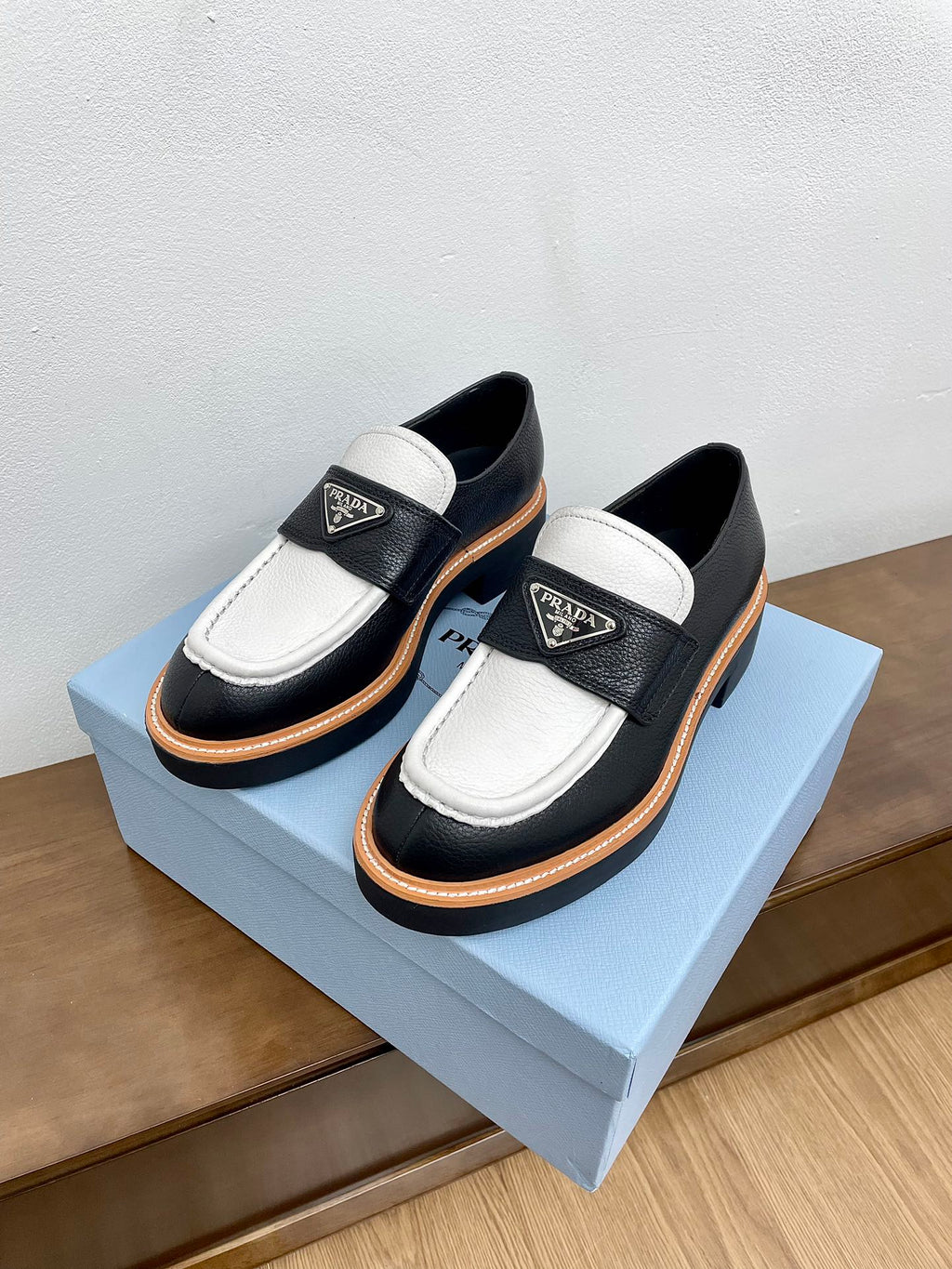 PRADA CHOCOLATE LOAFERS BLACK AND WHITE CALFSKIN