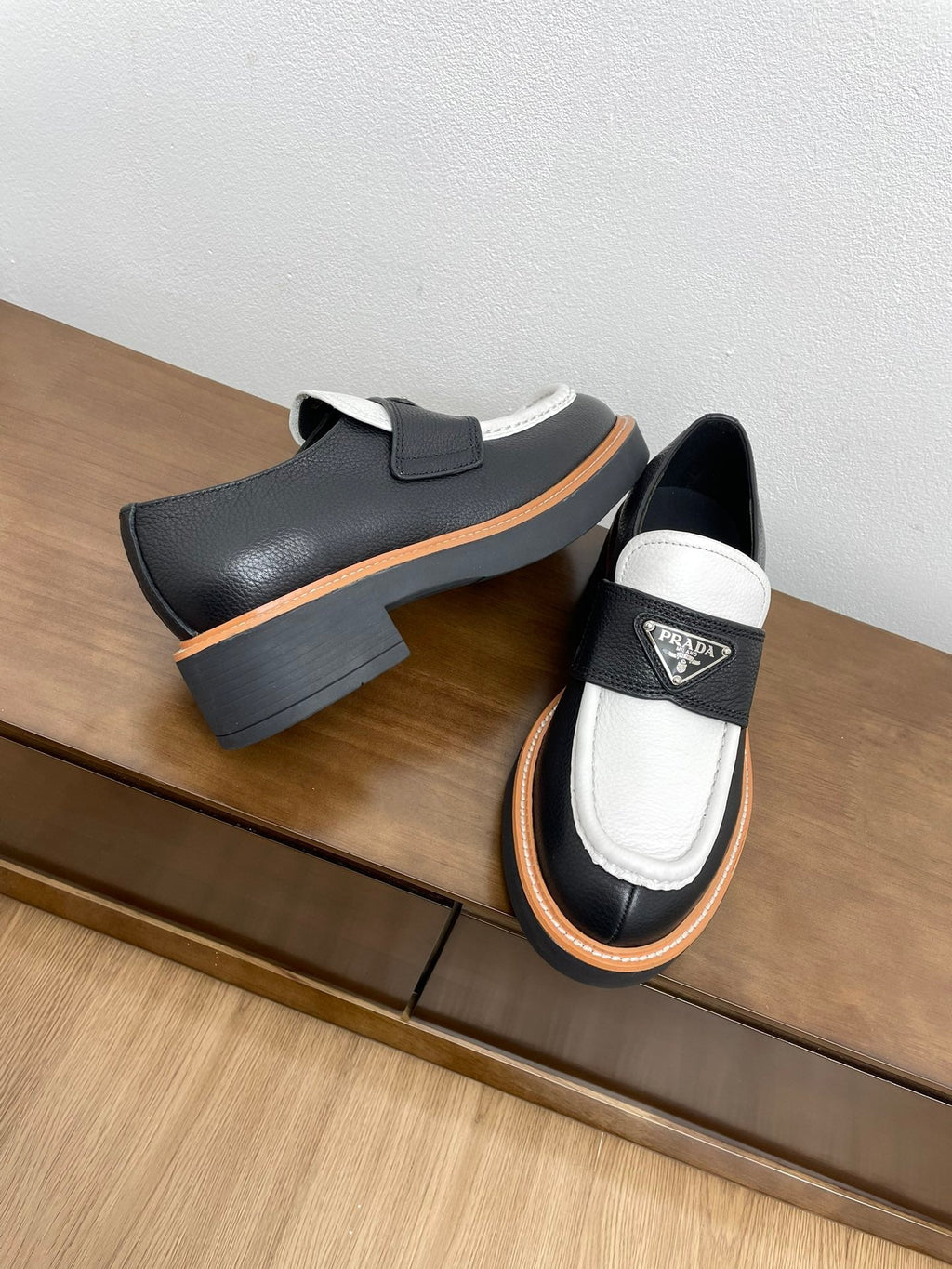 PRADA CHOCOLATE LOAFERS BLACK AND WHITE CALFSKIN