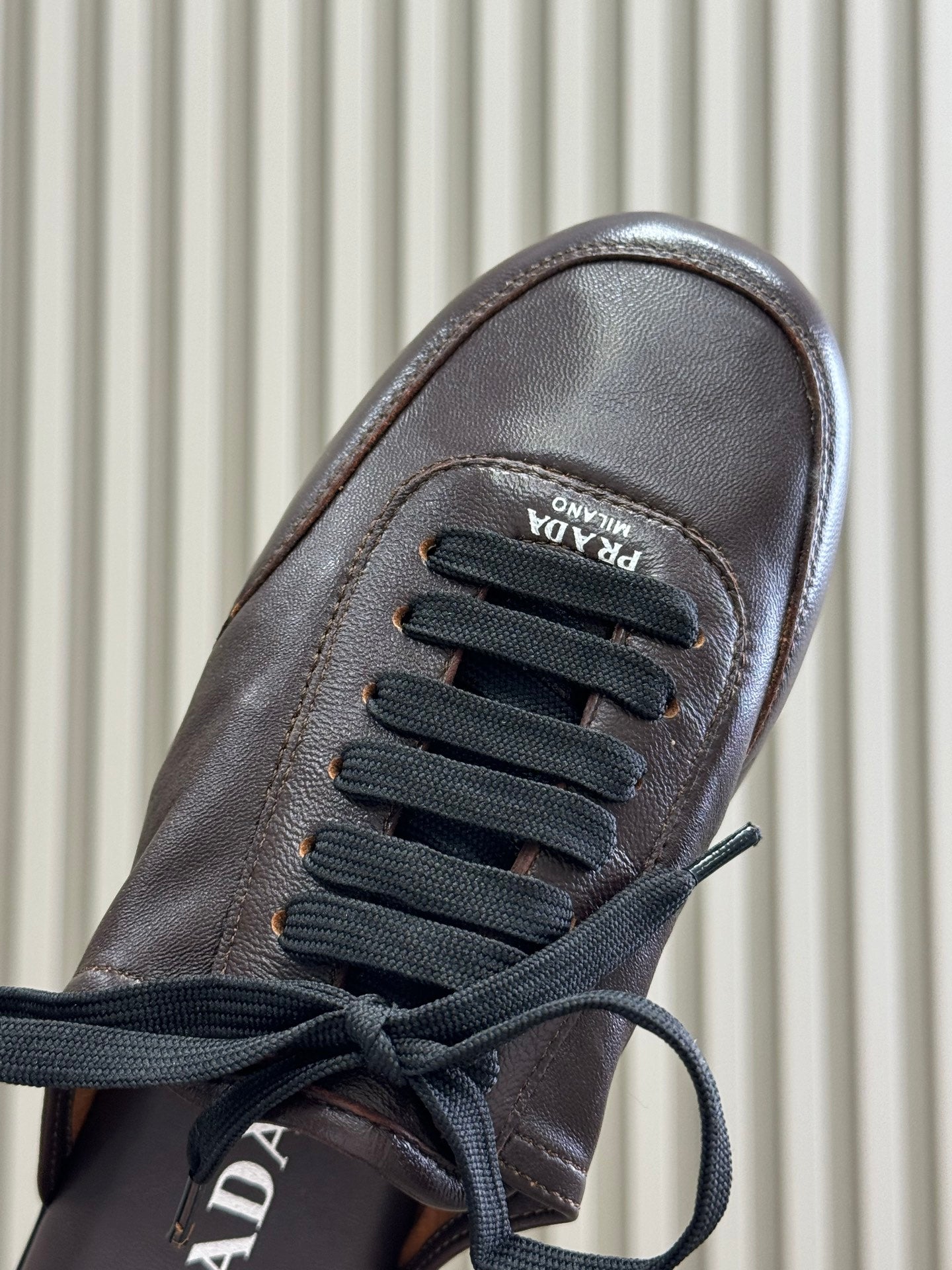 PRADA 25S COLLAPSE MULES IN RK BROWN CALFSKIN