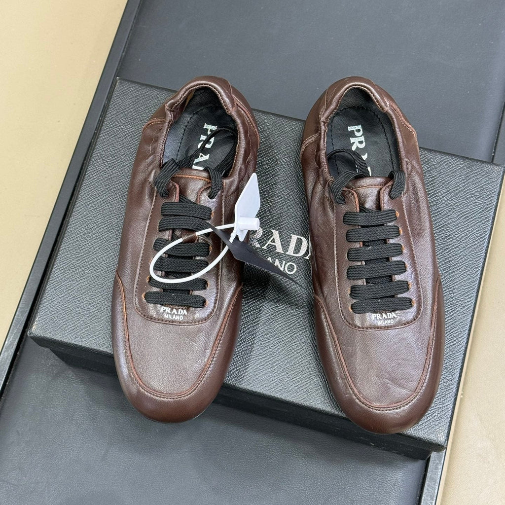 PRADA 25S COLLAPSE FLAT SHOES IN RK BROWN CALFSKIN