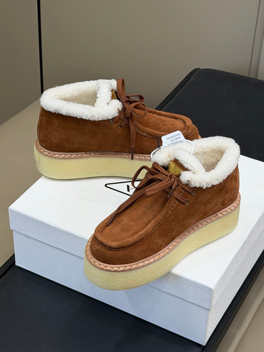 PRADA 25S HIGH-TOP SHOES 40 MM IN RK BROWN SUEDE SHEARLING-LINED