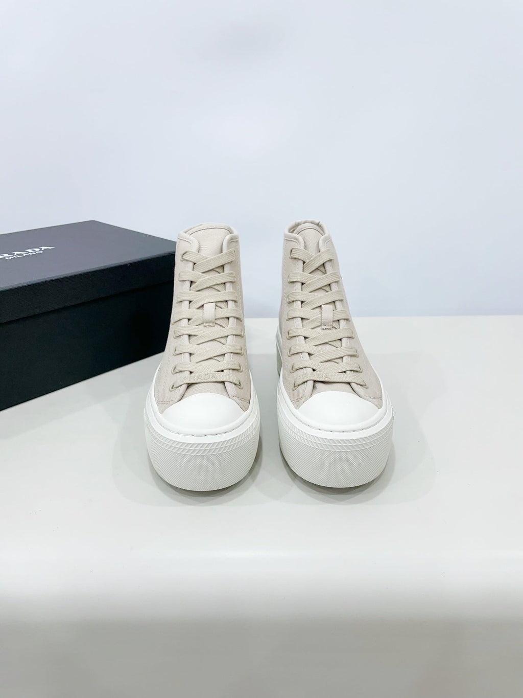 PRADA HIGH-TOP SEANKERS IN BEIGE CANVAS