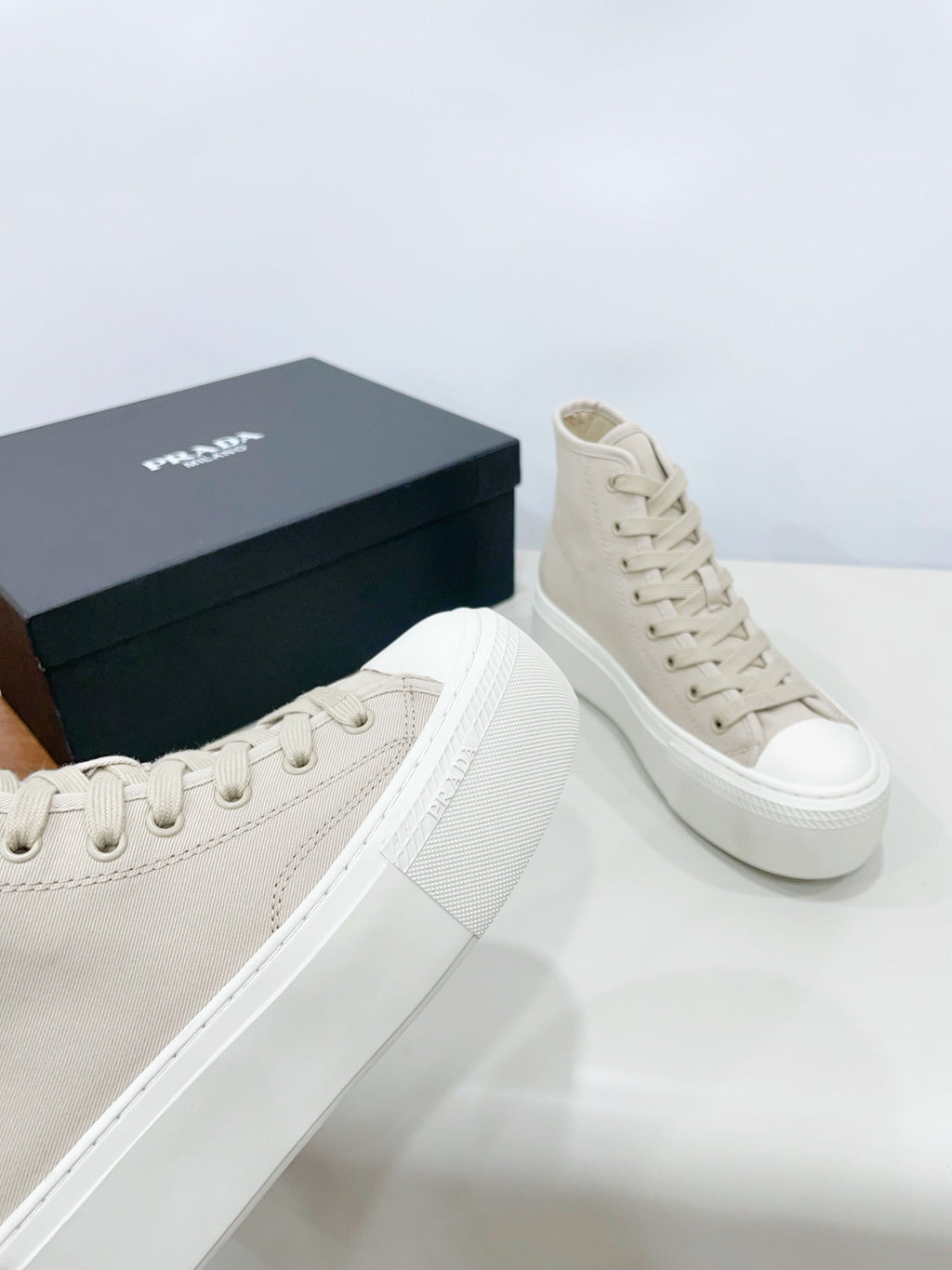 PRADA HIGH-TOP SEANKERS IN BEIGE CANVAS