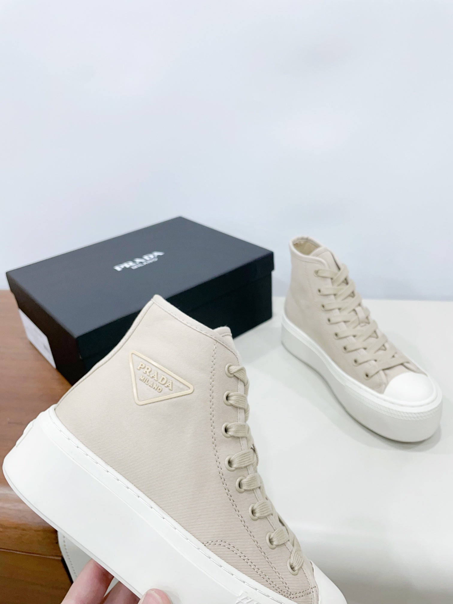 PRADA HIGH-TOP SEANKERS IN BEIGE CANVAS