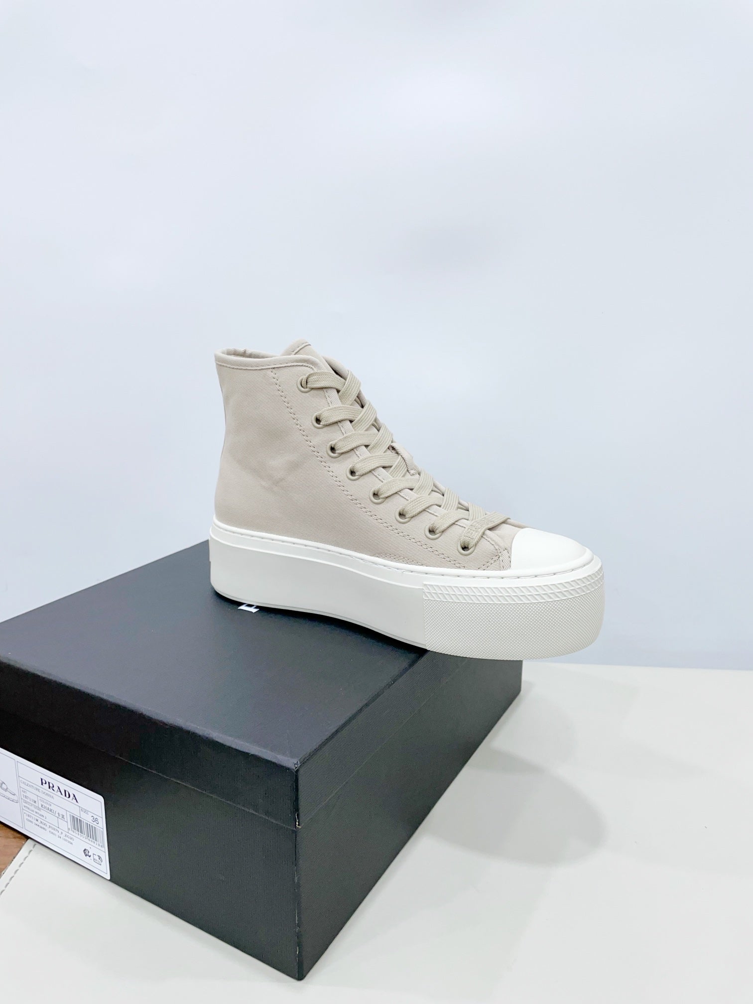 PRADA HIGH-TOP SEANKERS IN BEIGE CANVAS