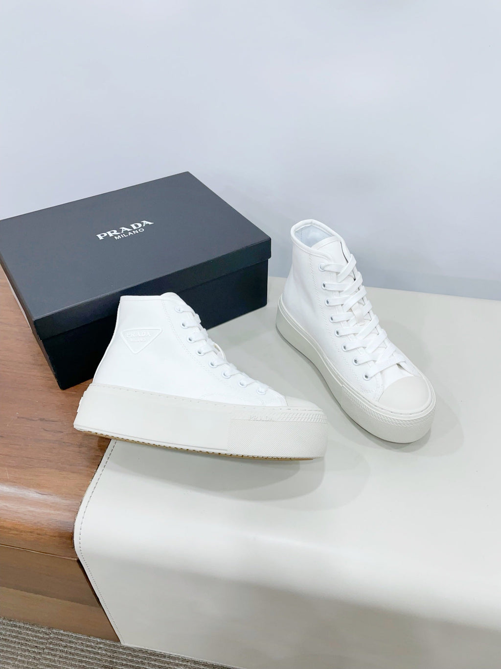 PRADA HIGH-TOP SEANKERS IN WHITE CANVAS