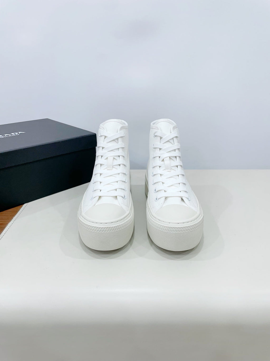PRADA HIGH-TOP SEANKERS IN WHITE CANVAS