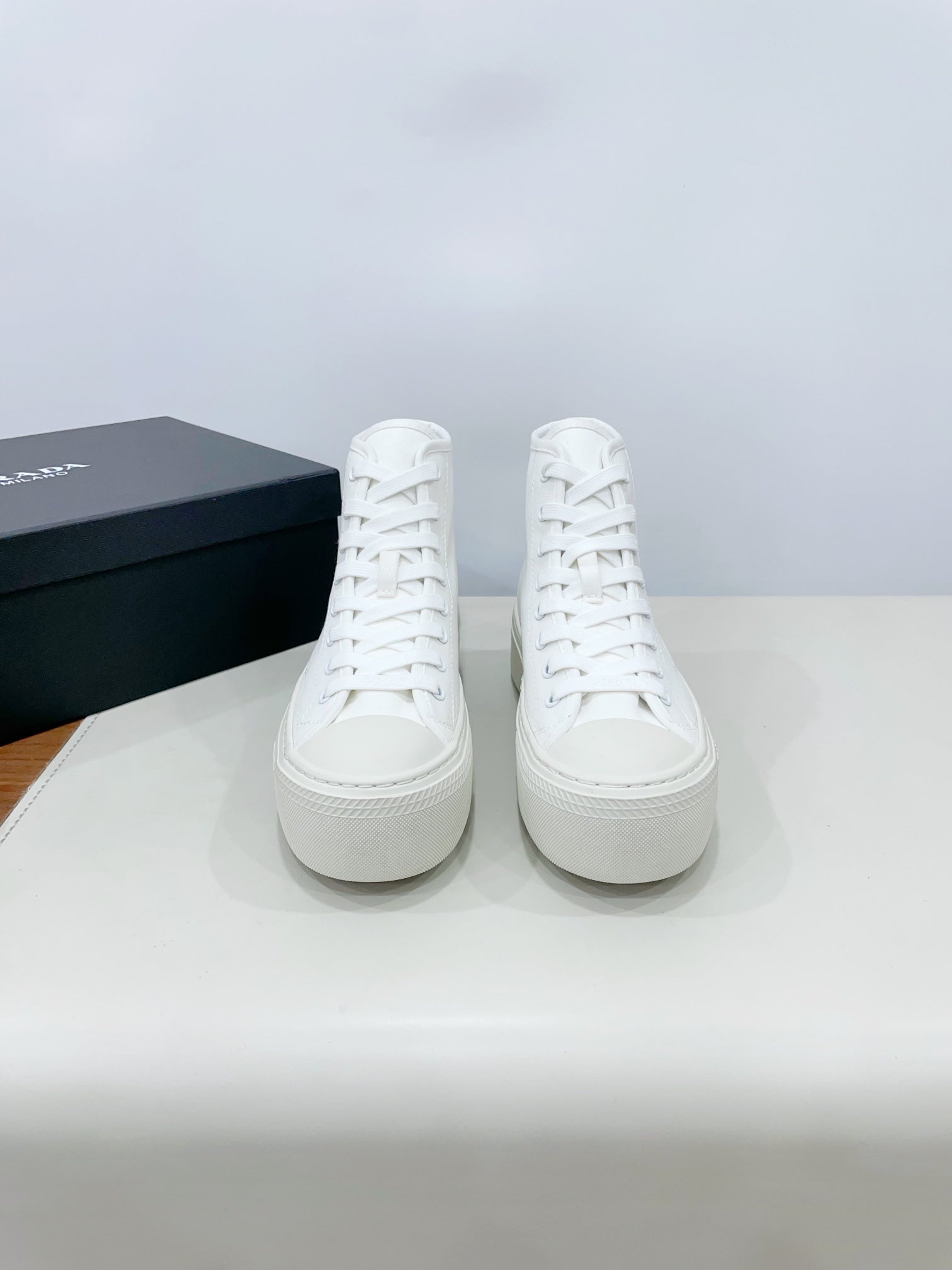 PRADA HIGH-TOP SEANKERS IN WHITE CANVAS