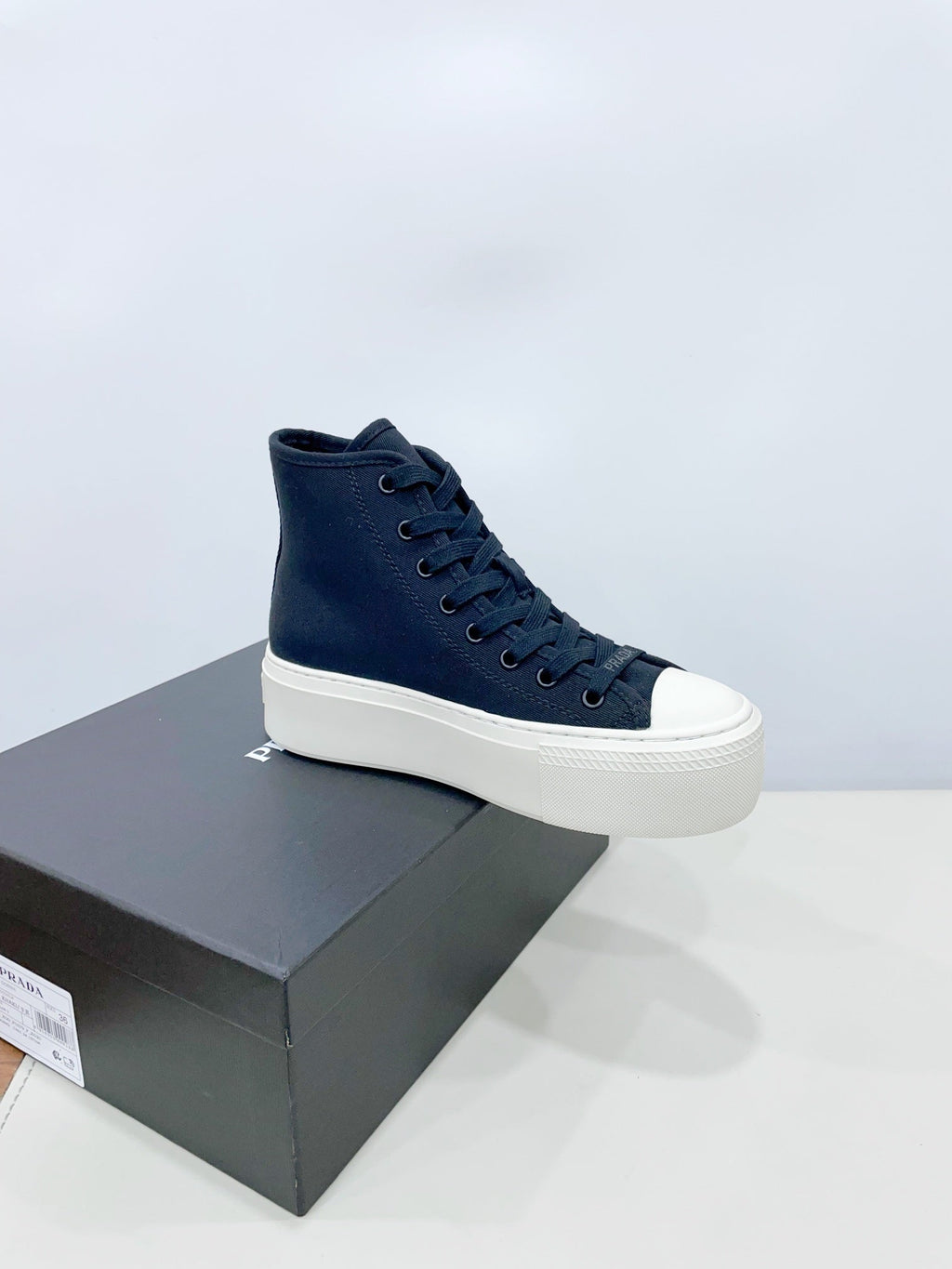 PRADA HIGH-TOP SEANKERS IN SPACE BLUE CANVAS