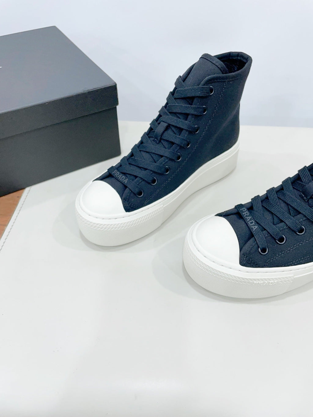 PRADA HIGH-TOP SEANKERS IN SPACE BLUE CANVAS